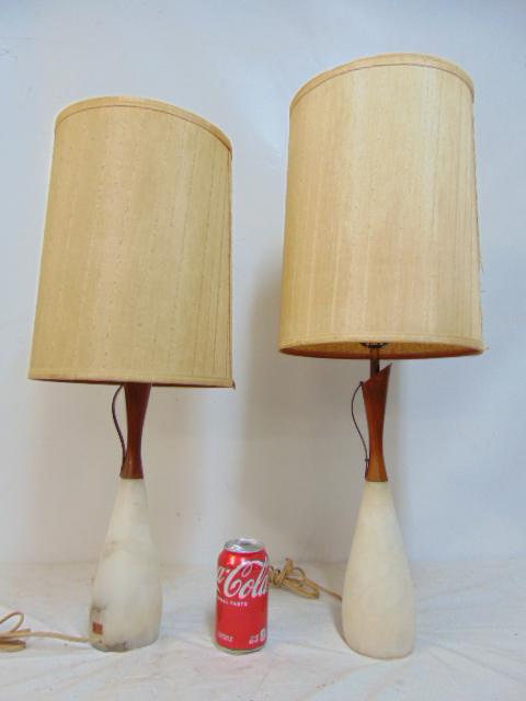 Pair Mid Century marble base table lamps with linen shades, brass & wood tops, ewer style, height is: Pair Mid Century marble base table lamps with linen shades, brass & wood tops, ewer style, height is 25.5" & 27.5", lamp bases are identical height, but one has replaced harp.