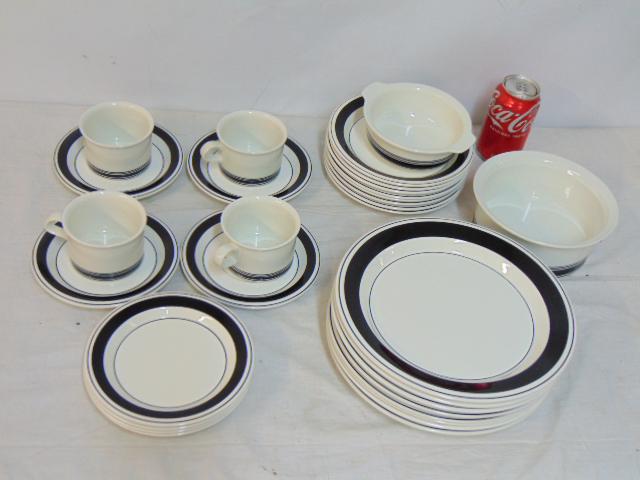 Set Arabia, Finland porcelain dinnerware, "Faenza", white with black trim, includes 4 cups and: Set Arabia, Finland porcelain dinnerware, "Faenza", white with black trim, includes 4 cups and saucers, 4 cake plates, 2 bowls, 8 dinner and 8 lunch plates.