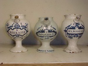 Lot of 3 blue & white Delft wet drug jars: Lot of 3 blue & white wet drug jars, glaze has cracks, minor chips to base and rim, height averages from 8.75" to 9.5". Note: This unique collection of 18th & 19th Century apothecary jars are all from