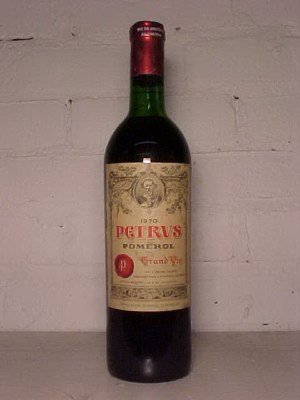 Red Bordeaux, Chateau Petrus pomerol, vintage 1970: Vintage 1970 bottle of Chateau Petrus Pomerol, a red Bordeaux, label in good condition, foil seal also good, as far as the contents is concerned, we have no clue, you are buying this "as is"
