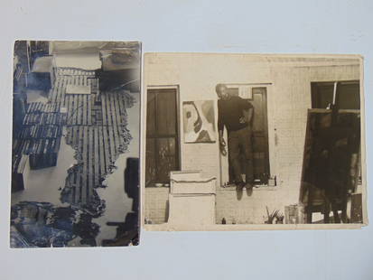 2 photographs, one showing Marzette Watts in a studio with various paintings, and the other of a: 2 photographs, one showing Marzette Watts in a studio with various paintings, and the other of a floor with plaster missing., 11" by 14" & 12.5" by 7.75"