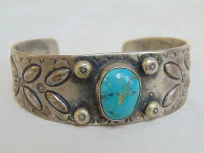 Jewelry. Navajo Native American sterling silver turquoise cuff bracelet w/ stamp work design &: Jewelry. Navajo Native American sterling silver turquoise cuff bracelet w/ stamp work design & central turquoise stone approx 15mm ; 53.54 grams; gap opening 1"; circumference 6"