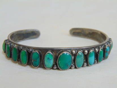 Jewelry. Navajo Native American Old Pawn sterling silver turquoise cuff bracelet w/ 13 individual: Jewelry. Navajo Native American Old Pawn sterling silver turquoise cuff bracelet w/ 13 individual set turquoise stones; 35.50 grams; gap opening 3/4"; 6 1/2" circumference