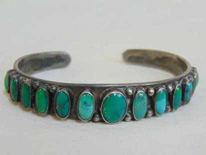 Jewelry. Navajo Native American Old Pawn sterling silver turquoise cuff bracelet w/ 13 individual: Jewelry. Navajo Native American Old Pawn sterling silver turquoise cuff bracelet w/ 13 individual set turquoise stones; 35.50 grams; gap opening 3/4"; 6 1/2" circumference