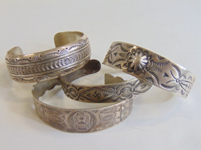Jewelry. (4) Vintage Native American sterling silver cuff/bracelets, all with stampwork motif (1 of 5)