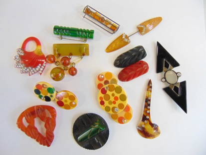 Jewelry. Vintage collection of bakelite, celluloid, plastic, & other. 12 pieces total. mother of: Jewelry. Vintage collection of bakelite, celluloid, plastic, & other. 12 pieces total. mother of pearl black onyx sterling pin. 2 polka dot pins & other