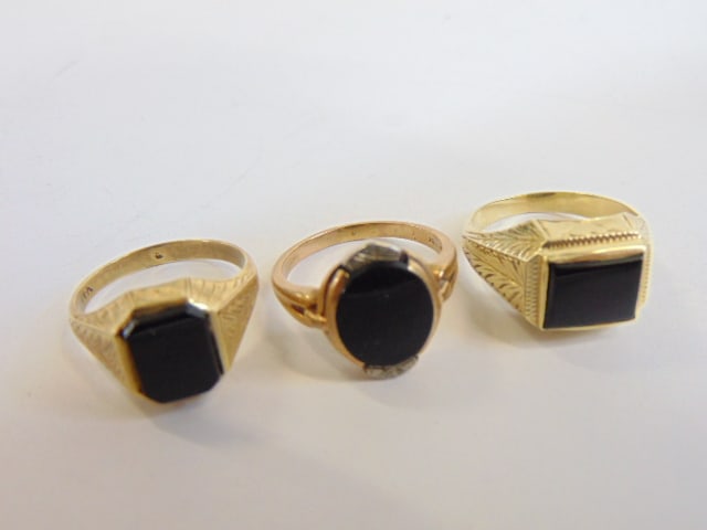 Jewelry. (3) gold rings 14kt & 10kt to include two 14kt mens black onyx rings w/ design on shank (1 of 5)