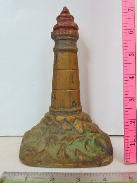 Cast iron doorstop, lighthouse, height is 7.25", original paint (1 of 3)