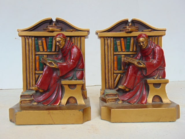 Pair L.V. Aronson painted Spelter bookends, dated 1920, reading Monk, Monk in red robe reading in (1 of 5)