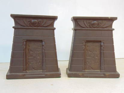 Pair Egyptian revival cast iron bookends, Egyptian temple form with winged disk over Hieroglyph: Pair Egyptian revival cast iron bookends, Egyptian temple form with winged disk over Hieroglyph decorated door, cast iron with bronze patina, probably Bradley & Hubbard (unsigned), 5.75" wide, height