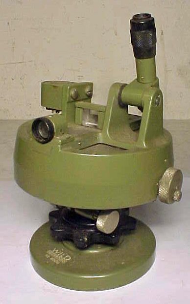 Wild Heerbrugg military sighting instrument: Wild Heerbrugg optical instrument, No. 6506. 5 1/2" tall. Optics foggy (dirty?) but sharp focus. Ungraduated crosslines. Hudson Valley Auctioneers has endeavored to accurately describe all items being