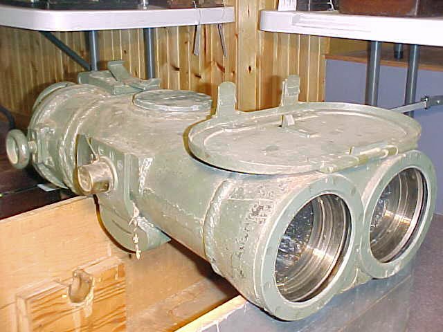 WW2 era Japanese navy targeting optics / binoculars: Massive WW2 era Japanese submarine or battleship binocular optics in large wooden crate. Crate measures 33" x 18" x 12". Piece is 31" long when closed. Has original cloth-covered rubber guards on eye 