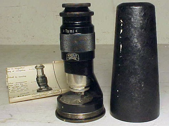 Hewsoldt Wetzlar "Tami" field microscope: Hewsoldt Wetzlar "Tami" field microscope in original box, with documentation. 5" long. Hudson Valley Auctioneers has endeavored to accurately describe all items being sold, but all property herein off