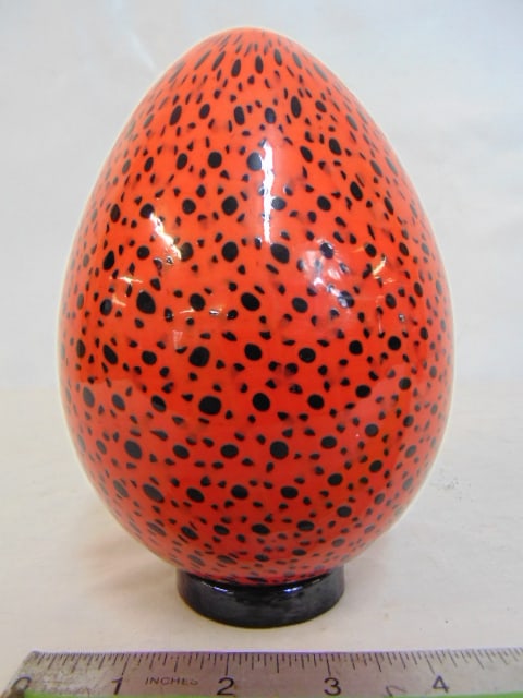 Venini art glass egg on glass base, in orange with black spots, height is 7", paper label, in good: Venini art glass egg on glass base, in orange with black spots, height is 7", paper label, in good condition, no chips.