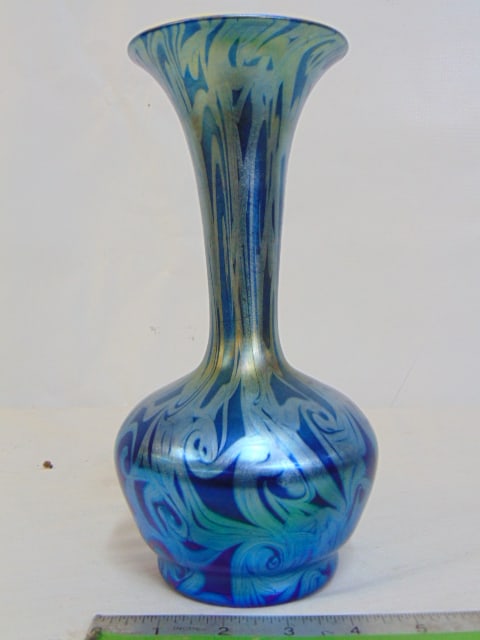 Loetz art glass trumpet vase, blue exterior, gold interior, exterior decorated with swirls in: Loetz art glass trumpet vase, blue exterior, gold interior, exterior decorated with swirls in different blue tones, vase is 9.5" tall, in good condition, no chips, crack or hairlines