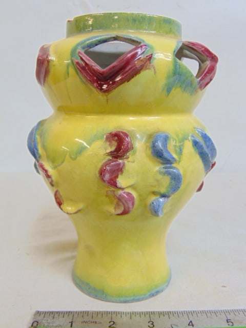 Wiener Werkstatte vase, in yellow with red, blue highlights, signed, has a several small chips, (1 of 9)