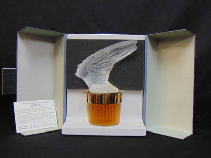 Lalique perfume bottle, ""Phoenix Mascot, Flacon-Collection, Edition de L'AN 2000", Pour Homme, with: Lalique perfume bottle, ""Phoenix Mascot, Flacon-Collection, Edition de L'AN 2000", Pour Homme, with certificate, excellent condition, filled, box is 6 7/8" by 4", height is 8.25"