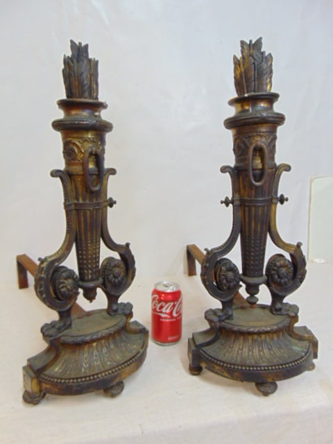 Pair bronze torch shaped andirons, height is 22", depth is 22.5", claw feet, one andiron is missing: Pair bronze torch shaped andirons, height is 22", depth is 22.5", claw feet, one andiron is missing small side screw.