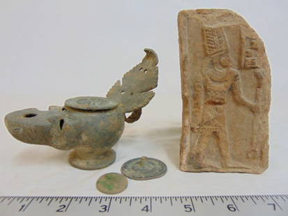 Ancient artifact lot, Egyptian carved stone fragment, early Etruscan (?) oil lamp with lid & two: Ancient artifact lot, Egyptian carved stone fragment, early Etruscan (?) oil lamp with lid & two small round dics (lid ?), Egytiam carved stone fragment is 5" by 2.5", oil lamp is 5" long, 4" tall.