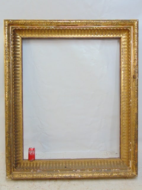 Large gilt carved wood frame, opening is 46.5" by 37.5", total size is 59" by 50", some loss of (1 of 8)