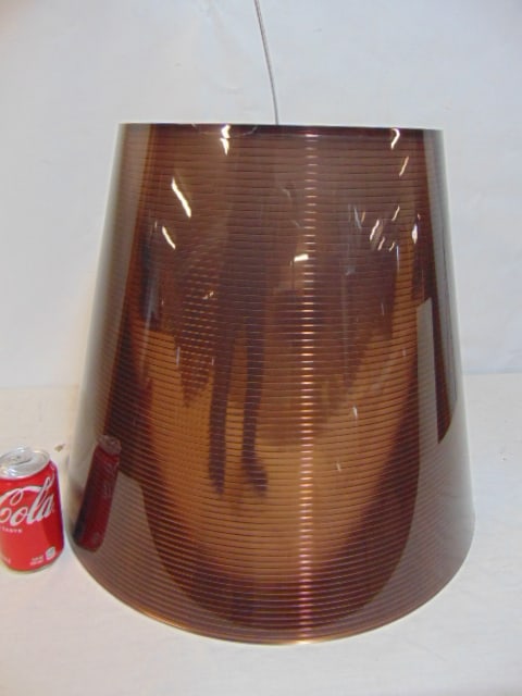 Philippe Starck for FLOS, S3, hanging fixture, bronze striped exterior, with white plastic interior: Philippe Starck for FLOS, S3, hanging fixture, bronze striped exterior, with white plastic interior diffuser, in original box, has small crack upper rin (see image, fixture is 17.75" tall, bottom diam