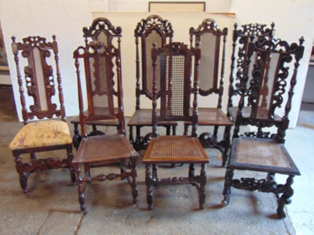Assembled set of 8 carved back, caned seat chairs, none match, all in used condition, tallest chair: Assembled set of 8 carved back, caned seat chairs, none match, all in used condition, tallest chair is 52"