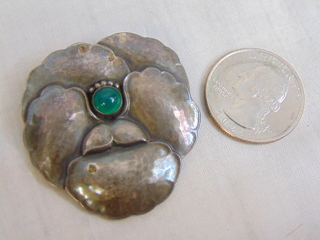 Jewelry. Georg Jensen sterling Flower/Pansy brooch/pin w/round green cabochon stone, no. 113 Denmark: Jewelry. Georg Jensen sterling Flower/Pansy brooch/pin w/round green cabochon stone, no. 113 Denmark 925 S Georg Jensen in a dotted oval hallmark, 14.55 grams, good condition