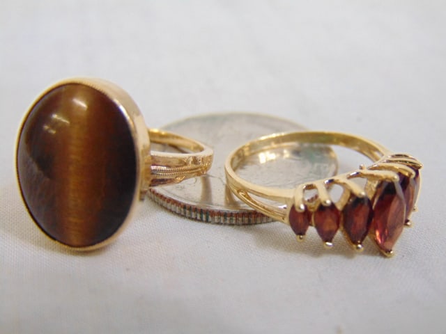 Jewerly. 2 Vintage 10kt gold rings, 7 graduated garnets size 6, 2.25 grams & tigers eye 10kt ring (1 of 4)