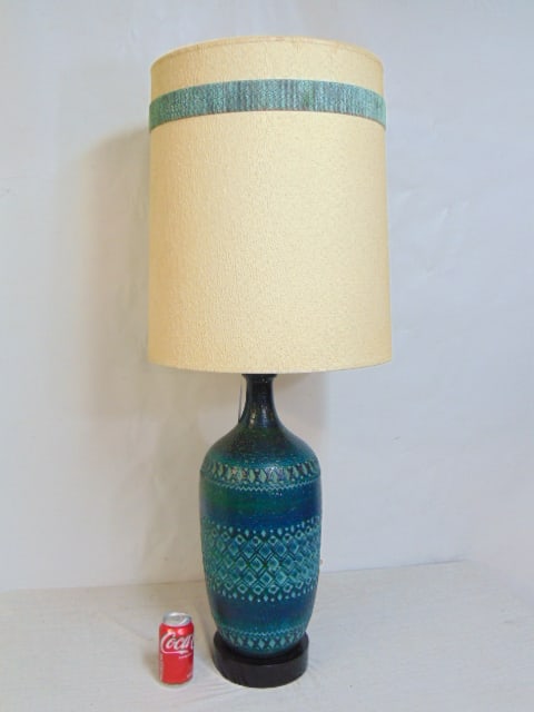 Mid Century art pottery table lamp in the style of Bitossi, in blues with diamond pattern bands,: Mid Century art pottery table lamp in the style of Bitossi, in blues with diamond pattern bands, height is 23.5" (excluding socket extension), total height with shade is 44", lamp has small chip.