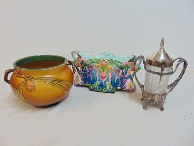 Roseville Pinecone planter, Majolica planter floral decorated & silver plated pickle jar with: Roseville Pinecone planter, Majolica planter floral decorated & silver plated pickle jar with frosted glass by Reed & Barton, has original insert, glass good, no chips, Majolica planter has repaired h