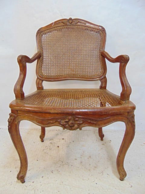 1750's French walnut armchair by Etienne Meunier, caned seat, back: 1750's French walnut armchair by Etienne Meunier, caned seat & back antique caned seat & back French chair, caning on seat torn, frame is weathered looking