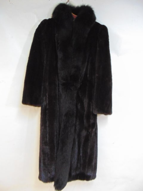 Long black mink fur coat by Blackglama, length is 48", arms are 23": Long black mink fur coat by Blackglama, length is 48", arms are 23"