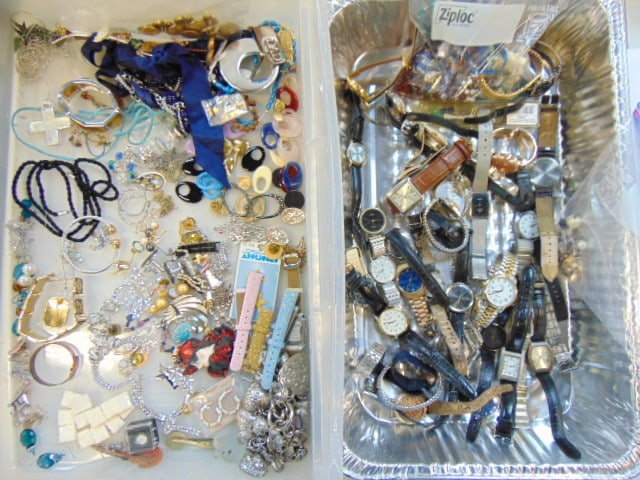 Large lot of wristwatches and costume jewelry, single sterling earrings, religious items, rosary: Large lot of wristwatches and costume jewelry, single sterling earrings, religious items, rosary beads, see photos for details
