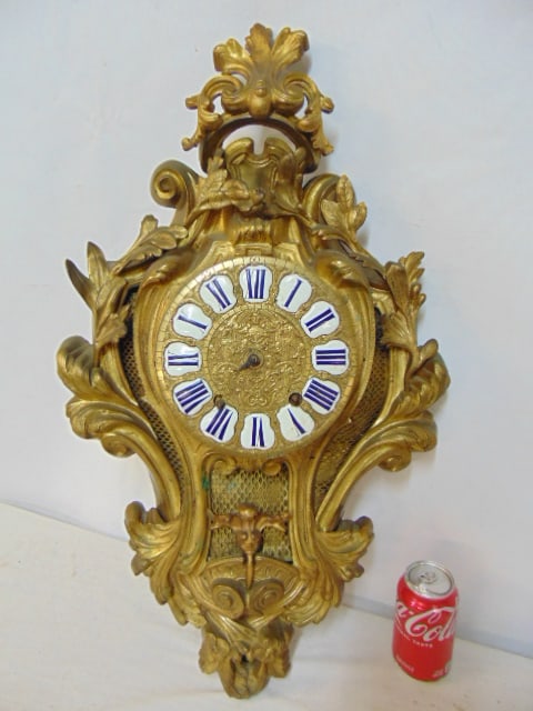 French brass wall clock with enameled numerals, clock is 29", no key, untested: French brass wall clock with enameled numerals, clock is 29", no key, untested