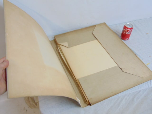 Portfolio with 8 views of the World Columbian Exposition in Chicago, 1893, 400 anniversary of: Portfolio with 8 views of the World Columbian Exposition in Chicago, 1893, 400 anniversary of Columbus, map is 22.5" by 17.25"matting on prints show foxing, as does the exterior, protection sheets are