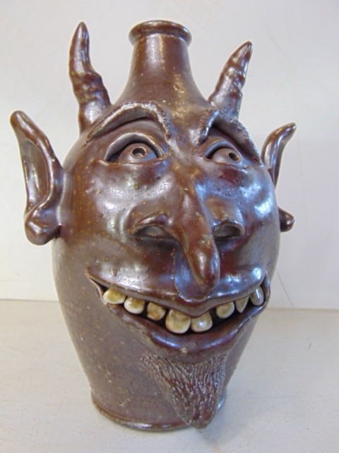 Salt fired devil face jug by Dave Weinandy, glazed dark brown terra cotta, in good condition, 8.75" (1 of 5)