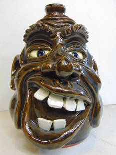 Big mouth face jug, Dwayne Crocker, dark brown glazed terra cotta, dated 2005, 10.25" tall, in good: Big mouth face jug, Dwayne Crocker, dark brown glazed terra cotta, dated 2005, 10.25" tall, in good condition.