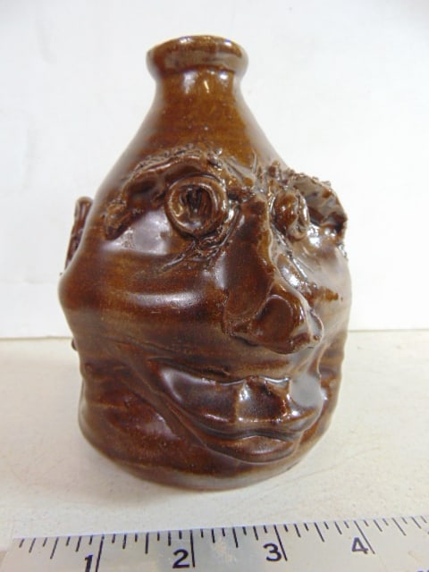 Face jug by M.T. McLennan, Hollytree, Ala. 1990, height is 6.5". (1 of 6)