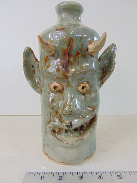 Devil face jug, signed Robert Crook, "Always Stout, and Never Sweet", light grey with white horns, (1 of 6)