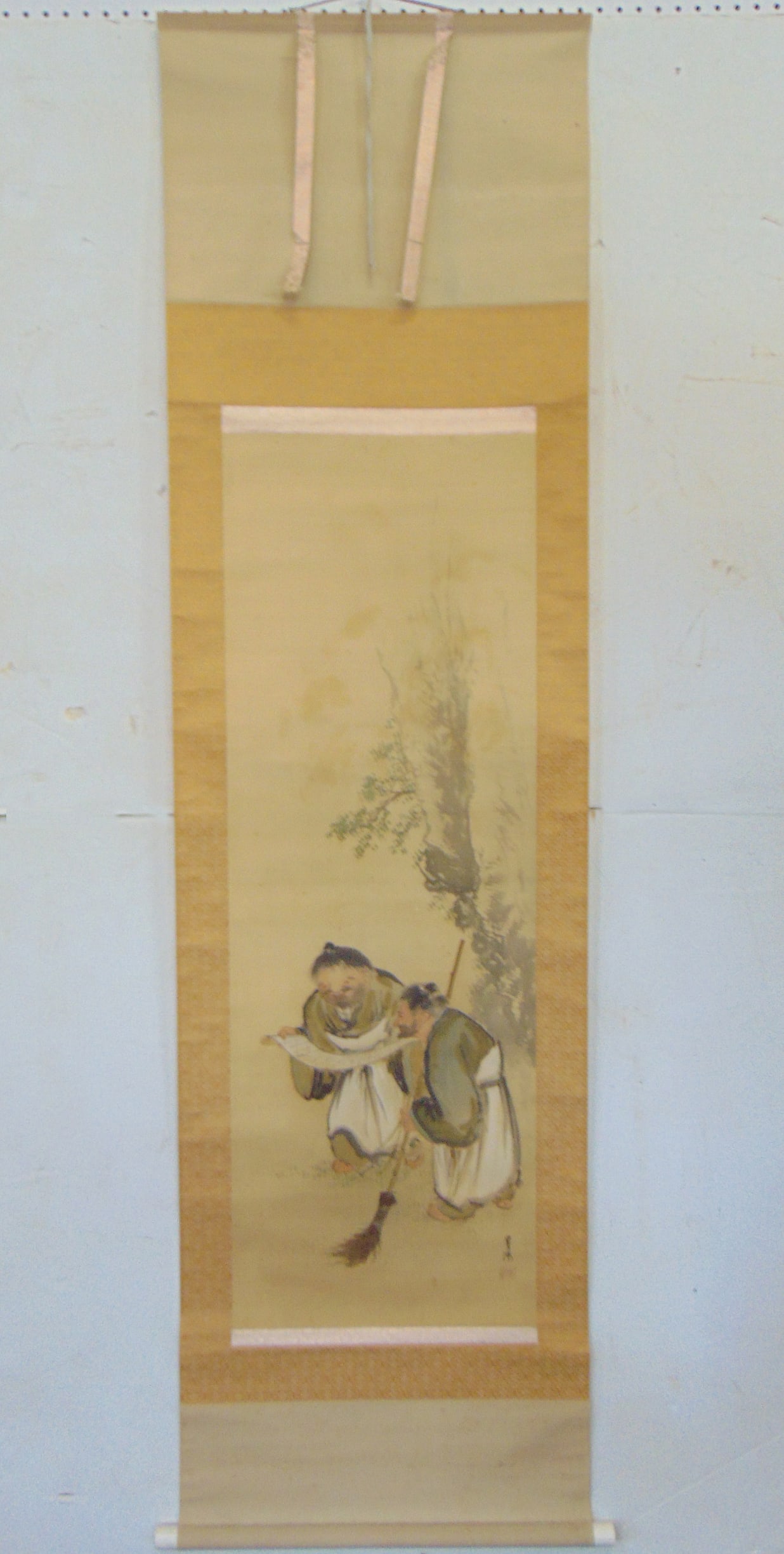 Chinese scroll, two figures, one with scroll, other with broom, signed, 77" by 21.5", scene is 46.5": Chinese scroll, two figures, one with scroll, other with broom, signed, 77" by 21.5", scene is 46.5" by 16"