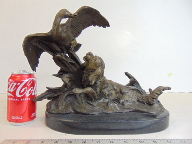 Bronze, dog going after duck, Barye, on stone base, 14" wide, 11" tall: Bronze, dog going after duck, Barye, on stone base, 14" wide, 11" tall. Size is approximate.
