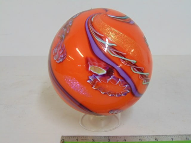James Nowack art glass ball, in orange with various designs, 7" in diameter. (1 of 5)