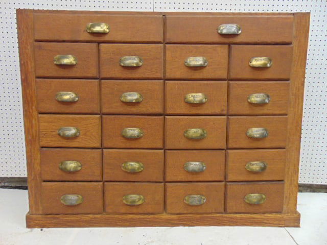 Oak apothecary cabinet, two large drawers over 4 vertical rows of 5 drawers, cabinet is 51.5" wide, (1 of 4)