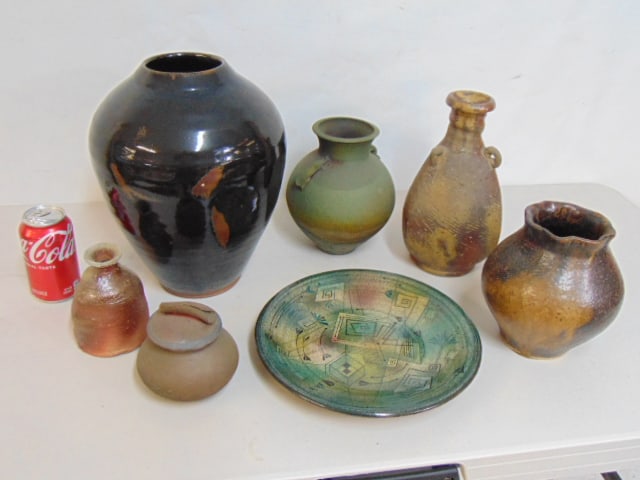 7 pieces of studio pottery, 5 vases, decorative platter & lidded bowl, large glazed black vase is (1 of 8)