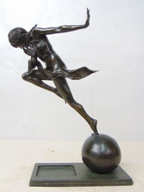 Art Deco bronze, running figure, signed M. Duryca, dark brown patina, insert (ashtray) is missing., (1 of 5)