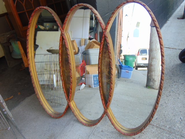 Large mirror, three overlapping ovals, gilt with red highlights, mirror is 48" tall, width is 54" (1 of 4)