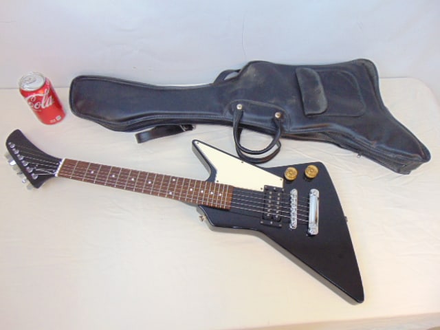 Small electric guitar, no markings, probably Epiphone Explorer, in good condition, no scratches, (1 of 5)