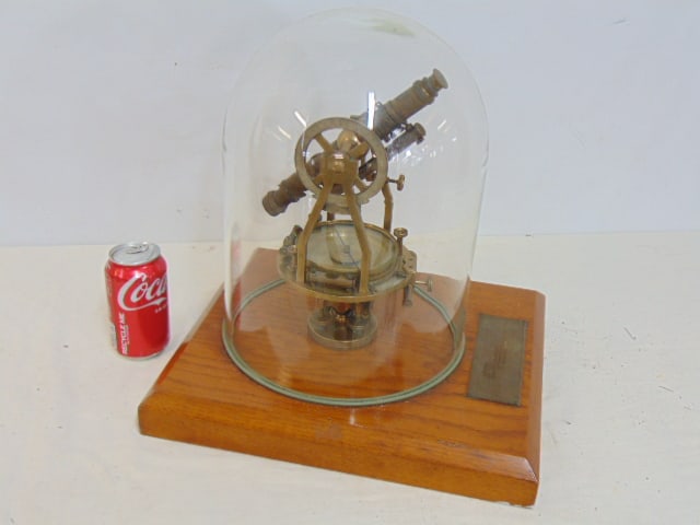 Brass transit under glass dome, "Presented to Arthur C. Schubring, on the occasion of his retirement: Brass transit under glass dome, "Presented to Arthur C. Schubring, on the occasion of his retirement from Wyandotte Chemical Corporation September 1958"