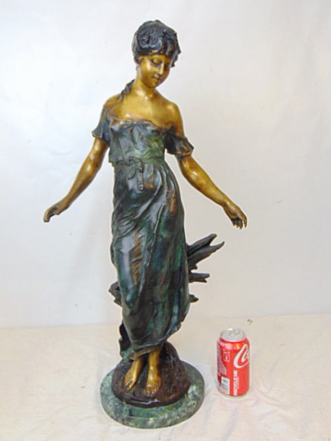 Bronze figure of a woman, after Auguste Moreau (reproduction), on marble base, mixed patina, height: Bronze figure of a woman, after Auguste Moreau (reproduction), on marble base, mixed patina, height is 28"