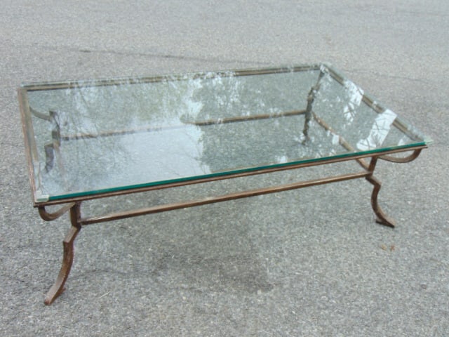 Large glass top, iron base coffee or cocktail table, top is 60" by 31.75", height is 18.5" (1 of 6)